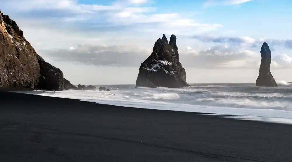 Rock formations at black sand beach in Iceland.
