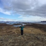 Scenic view of Icelandic landscape with water bodies and mountains, perfect for fish farming insights. Fish farm landscape in Iceland with water bodies and mountains in the distance.