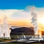 Industrial power plant emitting smoke at sunset, energy production, sustainable energy solutions, environmental impact, clean energy technologies.